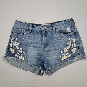 Free People women's boho embroidered cutoff denim shorts